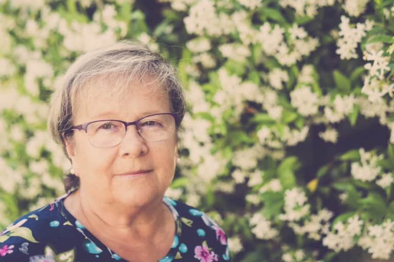 aged woman portrait with nature background nature