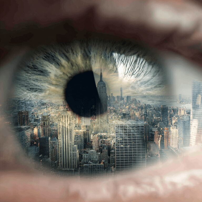 Eye reflecting a city skyline scene.